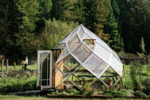 The space-age greenhouse, built by the couple with help from family, has become a local landmark in Guerneville. (Eileen Roche / Sonoma Magazine)