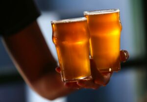 Beer lovers from around the world stand in line for their chance to taste Pliny the Younger at Russian River Brewing Company in Santa Rosa. (John Burgess/The Press Democrat) 