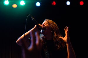 A fan reaches up to A Sun That Never Sets lead singer Mike McCubbin during a heavy metal concert at The Phoenix Theater in Petaluma, Calif., on April 19, 2013. (Alvin Jornada / The Press Democrat) Live Music at the Phoenix Theater for Santa Rosa Magazine Alvin Jornada