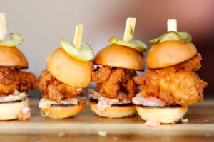 Buttermilk fried chicken sandwiches on a brioche roll with slaw and dijonnaise by chefs Marianna Gardenhire and Daniel Kedan of Backyard restaurant during the North Coast Food and Wine Festival at SOMO Village in Rohnert Park, California, on Saturday, June 10, 2017. (Alvin Jornada / The Press Democrat)