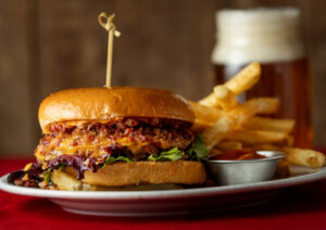 The Speakeasy Burger is a half-pound Angus burger with chopped bacon, chipotle aioli and greens on a brioche bun, from Speakeasy, Friday, February 7, 2025, in Petaluma. (John Burgess / The Press Democrat)