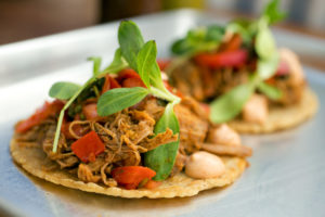 Dos Tacos with two yellow tortillas, your choice of meat, topped with chipotle aioli, pico de gallo, arugula and micro greens from Barrio Fresca Cocina Mexicana in Sebastopol's The Barlow. (Photo by John Burgess/The Press Democrat)