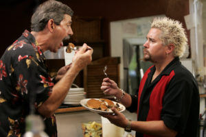 Guy Fieri tries blueberry pancakes at Hank's Creekside in Santa Rosa. (John Burgess/The Press Democrat)