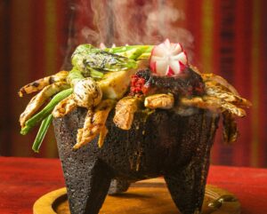 Molcajete Poblano of roasted poblano chile, chicken, chorizo, queso Panela, onions, radish and cactus from Los Molcajetes Bar & Grill in Rincon Valley on Wednesday, September 9, 2020. (John Burgess/The Press Democrat)