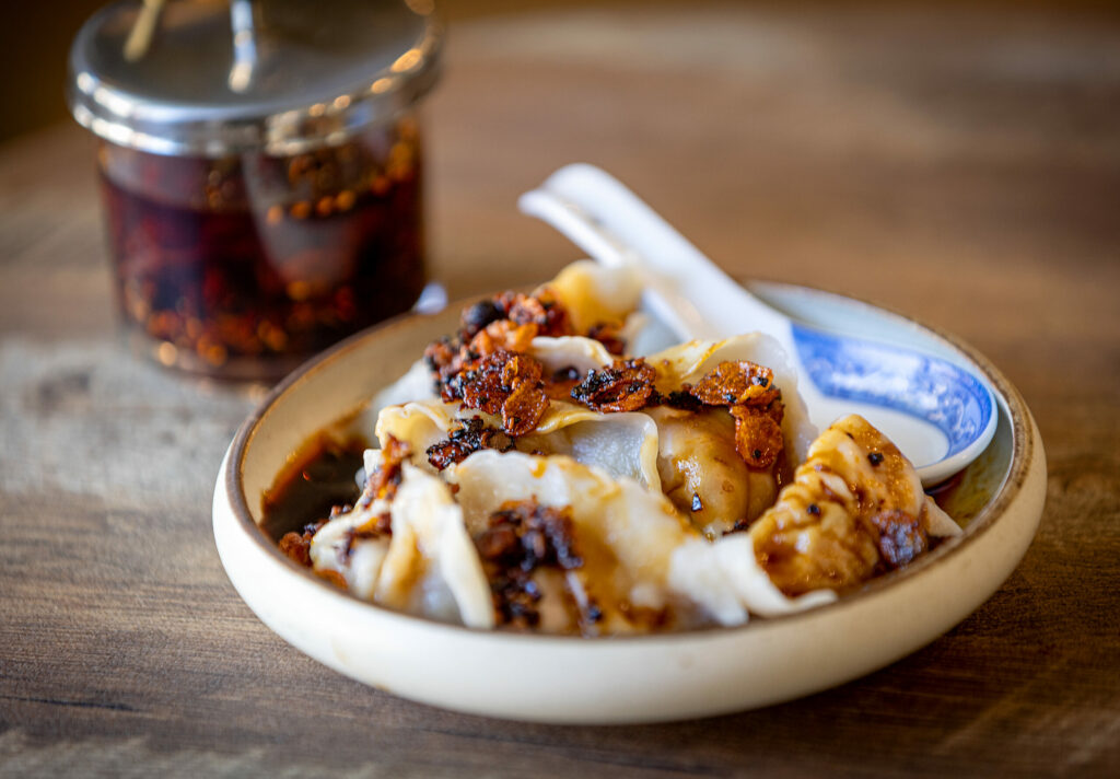Zhong Dumplings with BaSo homemade chili crisp and sweet pork dumplings from Bazaar Sonoma, BaSo | Restaurant & Konbini, Oct. 17, 2024, in Forestville. (John Burgess / The Press Democrat)