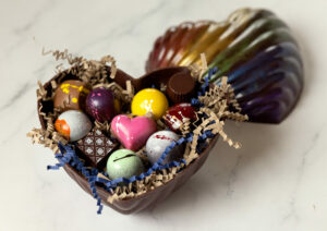 Robert Nieto, owners of Fleur Sauvage Chocolate, makes a chocolate box for his Valentines Day bonbon assortment Tuesday, January 16, 2024 in Windsor. (Photo John Burgess/The Press Democrat)