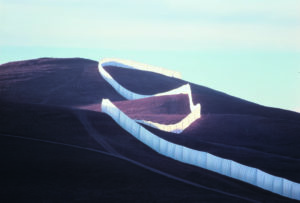 PC: The Running Fence follows the contours of the land as it rises to cross a ridge. Photo must be credited to Wolfgang Volz, copyright Christo 1976. From a large-format color transparency lent by Christo and Jeanne-Claude. 8/26/2001: 13-B: The Running Fence follows the contours of the land as it rises to cross a ridge.