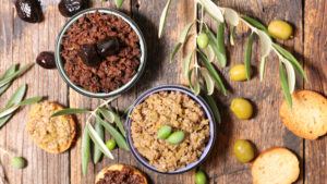 Assorted olive tapenade. (margouillat photo / Shutterstock)